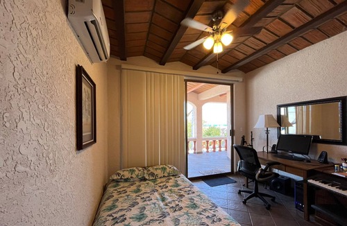 Caracol Turistico House | Multilevel home on top of Caracol Peninsula with beautiful views of San Carlos..