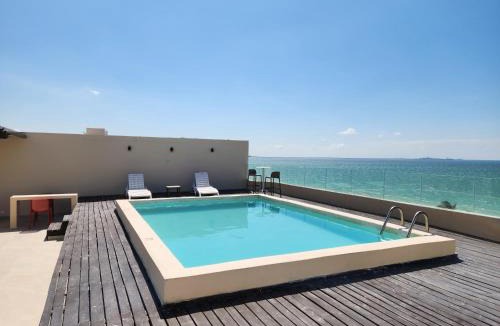 Chicxulub Puerto Apartment | OLEA Beach Condos en Chicxulub Puerto
