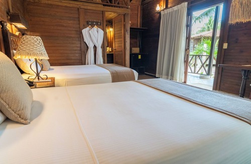 Villa Juarez Resort | Petit Lafitte Beachfront Hotel & Bungalows