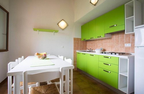 Pinarellu Apartment | Pinarellu Apartment Steps Away from Beach