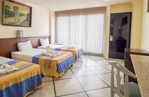 Merida Hotel | Relax at a Poolside Hotel in Mérida’s Centro District Near Dining & Local Market