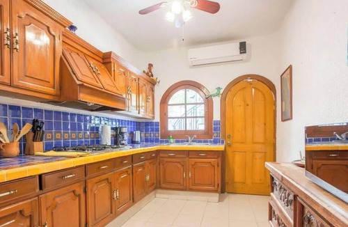 Lomas de Palmira Condo | Rooftop Views & Sunsets, Steps to the Malecón