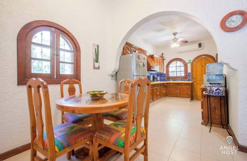 Lomas de Palmira Condo | Rooftop Views & Sunsets, Steps to the Malecón