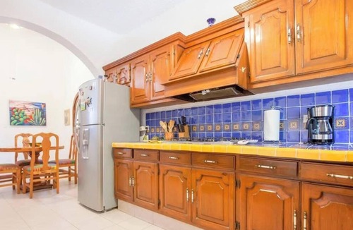 Lomas de Palmira Condo | Rooftop Views & Sunsets, Steps to the Malecón