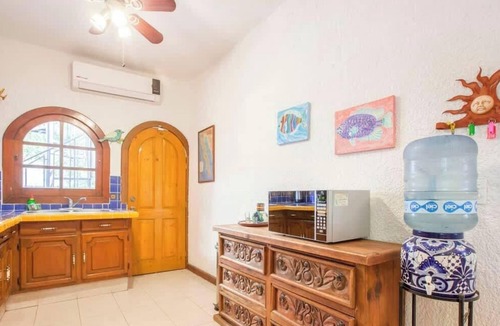 Lomas de Palmira Condo | Rooftop Views & Sunsets, Steps to the Malecón