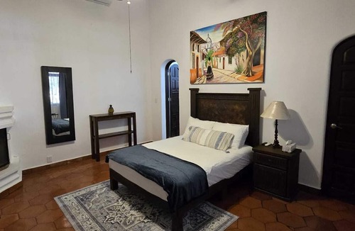 Ajijic Bed & Breakfast | Room " Los Limones" in Casa Caroline Bella