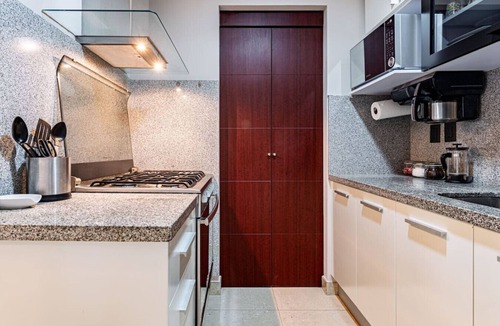 Ampliacion Granada Apartment | Sleek High-Rise with Pool, Gym, Jacuzzi & BBQ Area