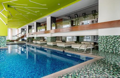 Ampliacion Granada Apartment | Sleek High-Rise with Pool, Gym, Jacuzzi & BBQ Area