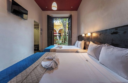 Centro Hotel | Stay in Four Bright Rooms Steps from Shops, Dining, & Merida Attractions