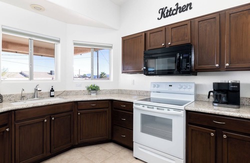 Lake Havasu City House | STOCKED Pool Home, RV & Boat parking, Game room. Sleeps 13