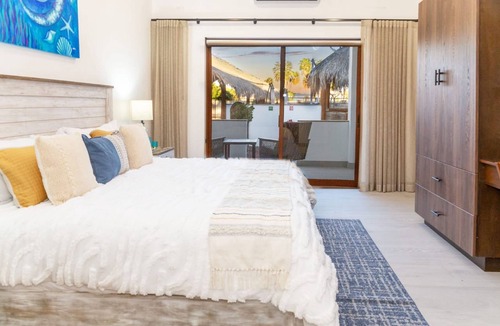 Loreto Villa | Stunning Villa with a highlight rooftop area, heated pool, balcony, & WIFI