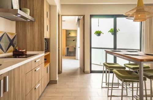 Gonzalo Guerrero Condo | Stylish Condo 1 Block to Beach & Rooftop Pool