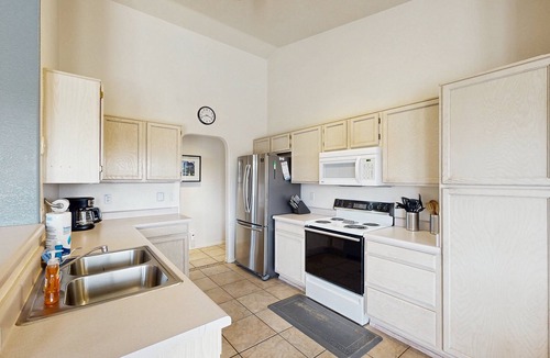 Casas Adobes House | Sun-filled dog-friendly home with private pool, putting green, & mountain views