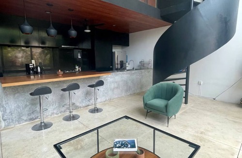 Merida House | Tropical townhouse