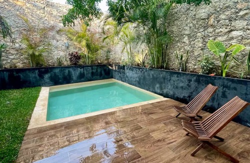 Merida House | Tropical townhouse