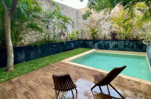 Merida House | Tropical townhouse