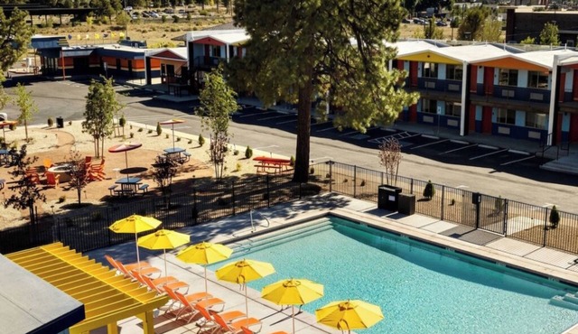 A Stylish Room Blending Retro Vibes and Modern Conveniences | Outdoor Pool