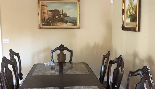 A warm home environment secluded in the woods yet 5 minutes from downtown.