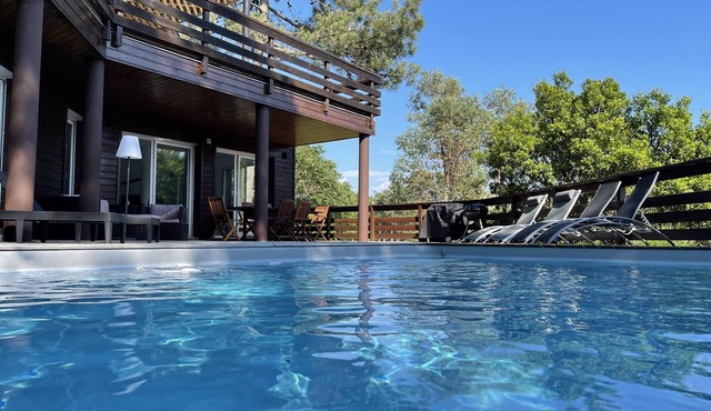 Architect-designed villa with heated pool, 1 km beach and EV terminal