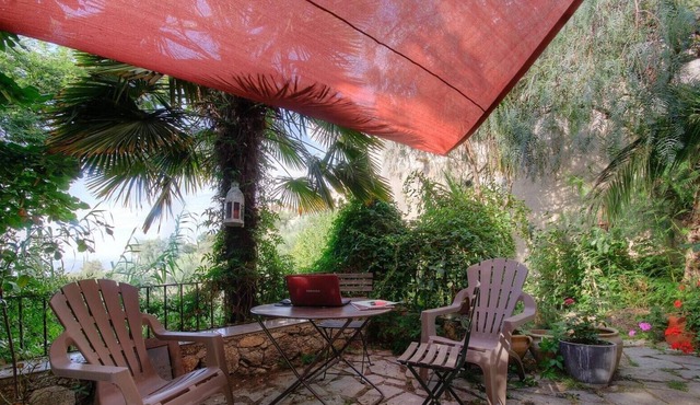 Casa Costa. LAMA. Durable and reasoned. Studio, terrace above the olive trees,