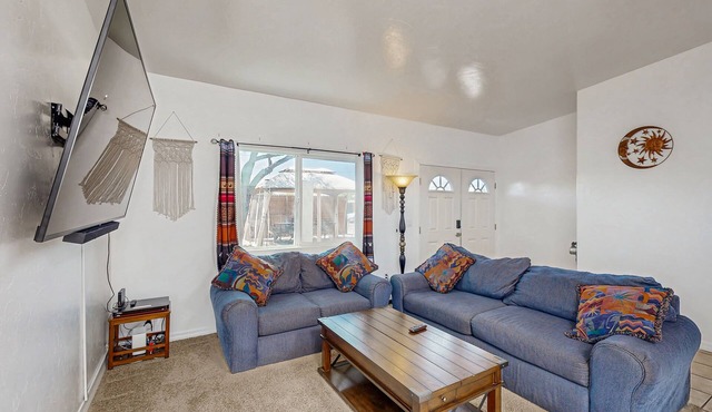 Cozy home with nice backyard, southwestern decor, & central location
