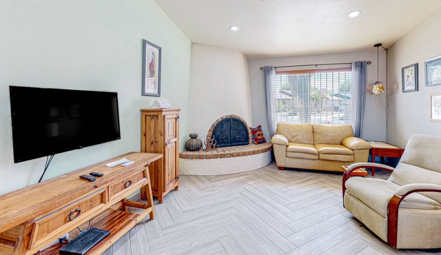 Dog-friendly desert home with an enclosed yard, patio, W/D, & AC - mtn views