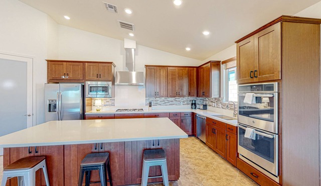 Dog-friendly home with a patio, putting green, & games - pool and gym access