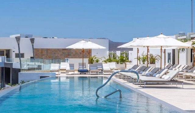 Escape to luxury in this elegant 1-bedroom suite at Garza Blanca Cabo.