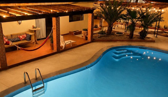 Family home with private pool, loft and garage, super central location!
