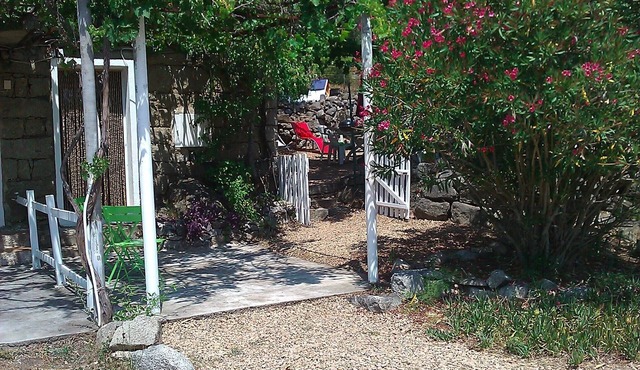 Granite house, with large shady garden .