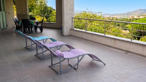 Maison confortable avec vue sur la mer et la montagne à Oletta.