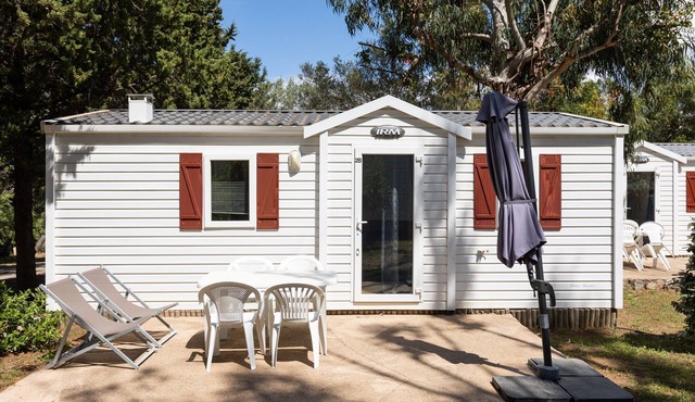 Mobile Home 'Village Camping De L'Ostriconi 28' with Sea View, Shared Pool and Wi-Fi