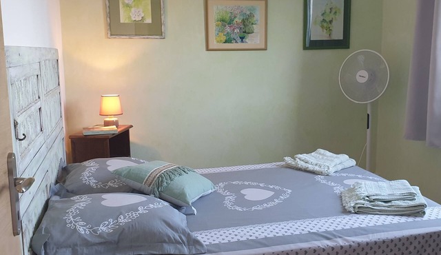 Quadruple room (2 bedrooms) in a village house "A Caserella"