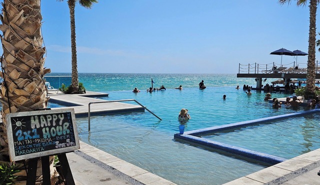 Stunning 5 O'Clock Somewhere Beachfront Condo
