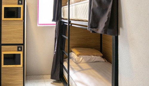 Bed in a 10-bed female shared dormitory
