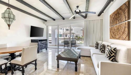 Deluxe Two Bedroom with One King and One Queen Beds - Pool View