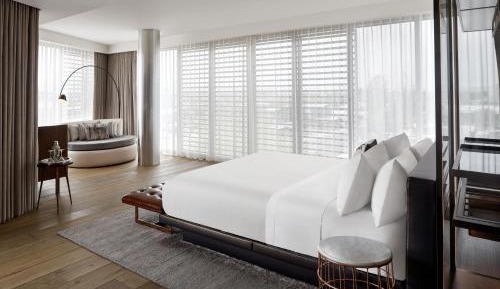 Premier King Suite with Wet Deck View and Balcony - Roll-In Shower/Mobility and Hearing Accessible
