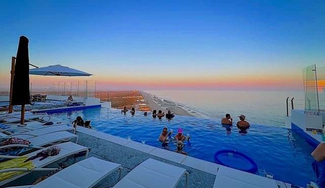 Modern beach-front luxury with sunset views and miles of undisturbed beach.